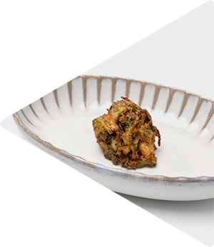 Bhaji van kokkels en ui
